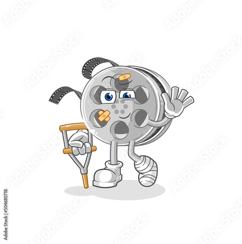 film reel sick with limping stick. cartoon mascot vector