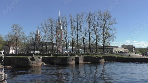 Locks of the Staroladozhsky (Petrovsky) canal in the city of Shlisselburg, Leningrad region. View of the Annunciation Cathedral - the Orthodox church of the town. photo