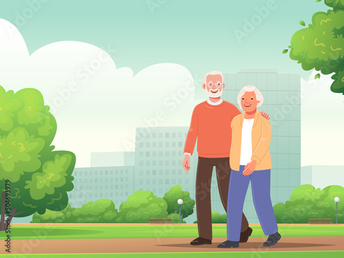 Cute elderly couple is walking in a city park. Happy seniors actively spend time outdoors