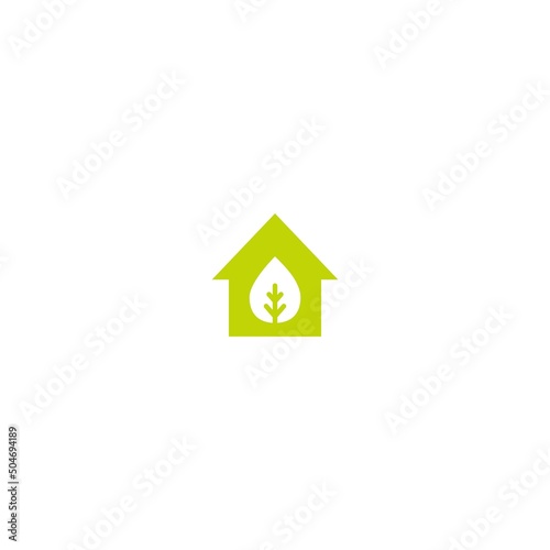 Flat green home with green leaf inside. Simple silhouette of the house. Vector building symbol. Eco friendly house. recycle and reuse home sign.