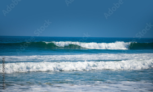 Fototapeta Naklejka Na Ścianę i Meble -  Ocean or sea tropical waves. Ocean background, seascape. Tropical beach with wave, nature background. Copy space of summer vacation and travel concept.