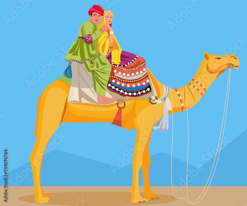 Young couple riding camel wearing traditional dress