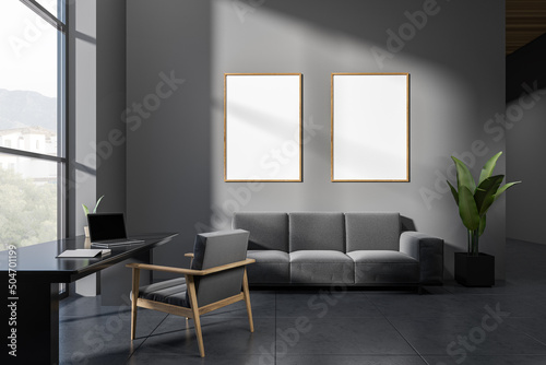 Grey office interior, couch and table with laptop, window. Mockup frames