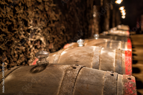 Wooden barrels in the wine cellar of Tokaj. photo
