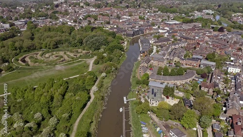 Aerial footage along the River Ouse as it enters the town of Lewes in East Sussex in Southern England. photo
