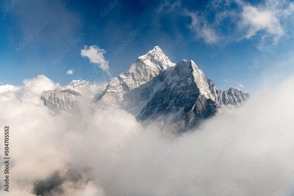 Awesome photo of a mountains in snow in a clouds, Nepal