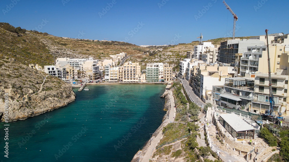 Aerial view of beautiful Xlendi Bay from drone, Gozo