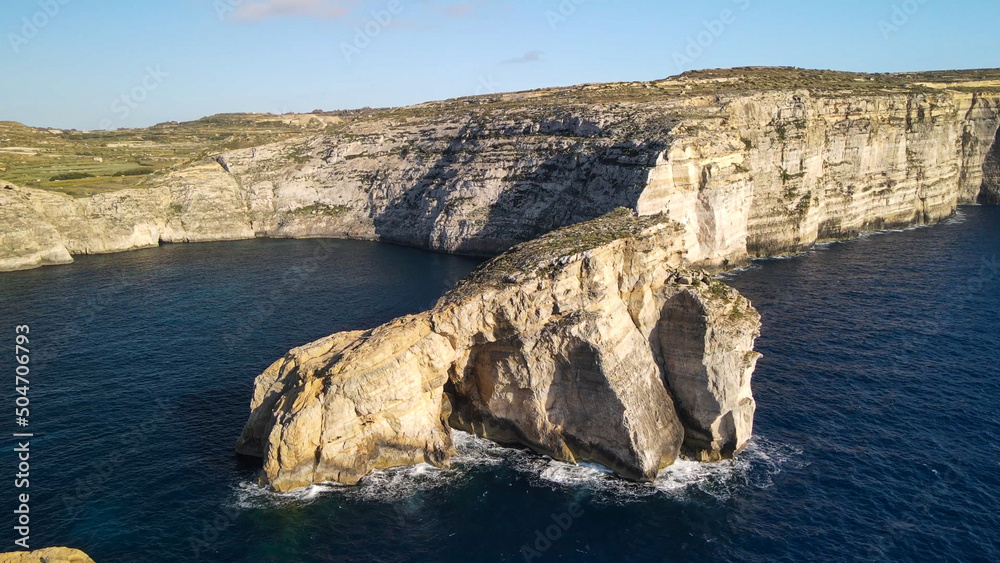 Aerial view of Fungus Rock in Dwejra Bay, Gozo