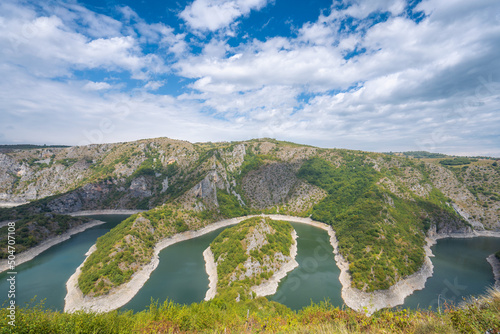 Meanders at rocky river Uvac gorge on sunny day, southwest Serbia. photo