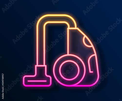 Glowing neon line Vacuum cleaner icon isolated on black background. Vector