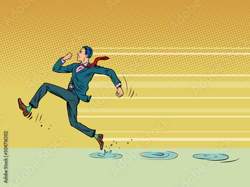 businessman runs fast through puddles, rain, wet weather