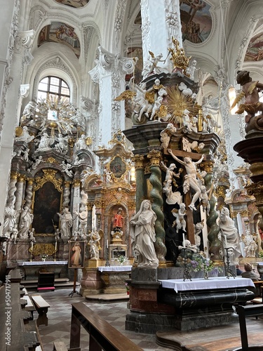 the interior of the Catholic Church with frescoes and stucco