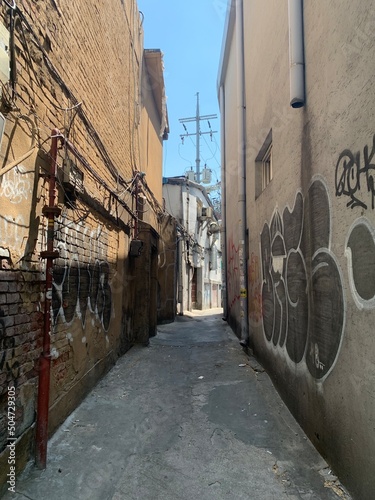 빈티지한 그래피티가 그려긴 골목길, 한국 명동 남산 을지로 인근 / An alley with vintage graffiti, near Eulji-ro, Namsan, Myeong-dong, Korea photo