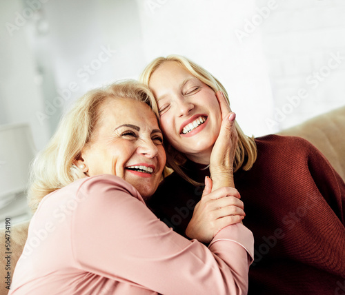 child mother daughter grandmother granddaughter family parent home woman happy kid grandma grandchild together girl mom grandparent edlerly hug hugging photo