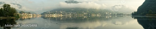 Panorama Lugano Lake from Ponte Tresa Italy to Caslano Switzerland. photo