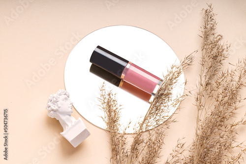 Εκτύπωση καμβά Lip gloss on a beige background