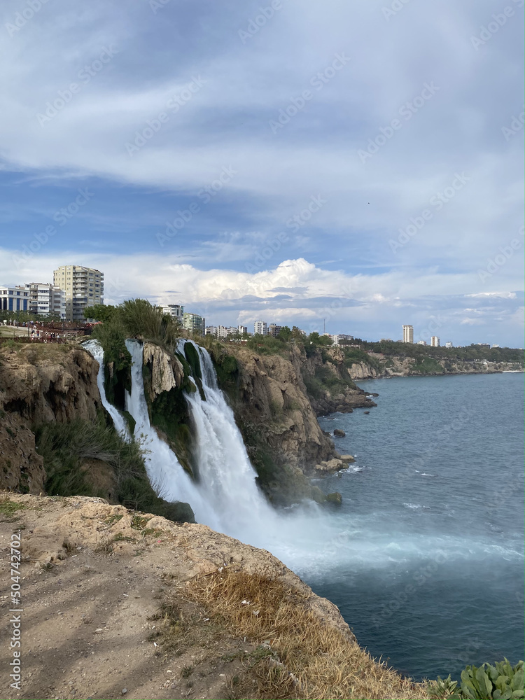 Duden waterfall in Antalya, Turkey in a beautiful summer day. Lower Duden waterfalls on Mediterranean sea coast Duden waterfall in Antalya, Turkey in a beautiful summer day. Lower Duden waterfalls on Mediterranean sea coast