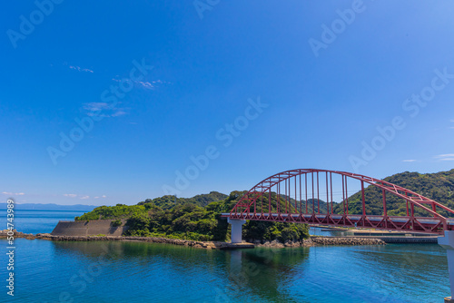長崎半島先端から見た樺島大橋（アーチ橋） © yoshitani