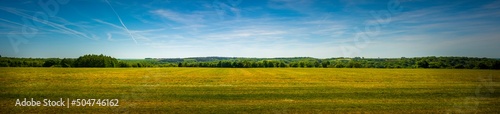 Panorama shot of an agricultural field in the sloping hills of the Condroz in Wallonia  Belgium.