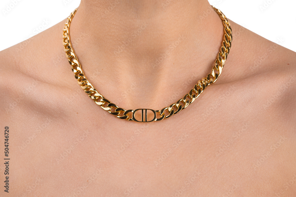 model in modern gold metal necklace chain. Necklace on woman's neck. women's gold pendant around the neck of a girl, women's jewelry, women's accessories, women's jewelry. model in modern gold metal necklace chain. Necklace on woman's neck. women's gold pendant around the neck of a girl, women's jewelry, women's accessories, women's jewelry.
