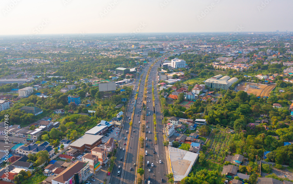 Aerial view of cars driving on highway or moterway. Overpass bridge street roads in connection network of architecture concept. Top view. Urban city, Bangkok, Thailand.
