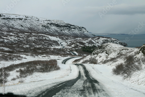 Snow winding road on an Icelandic coast