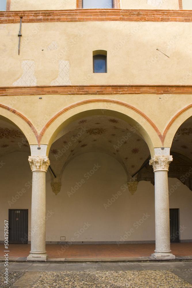 Medieval courtyard at Milan's Castello Sforzesco also known as Sforza Castle