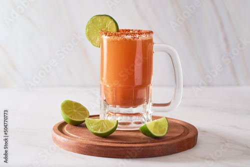 Homemade Michelada with Beer and Tomato Juice photo