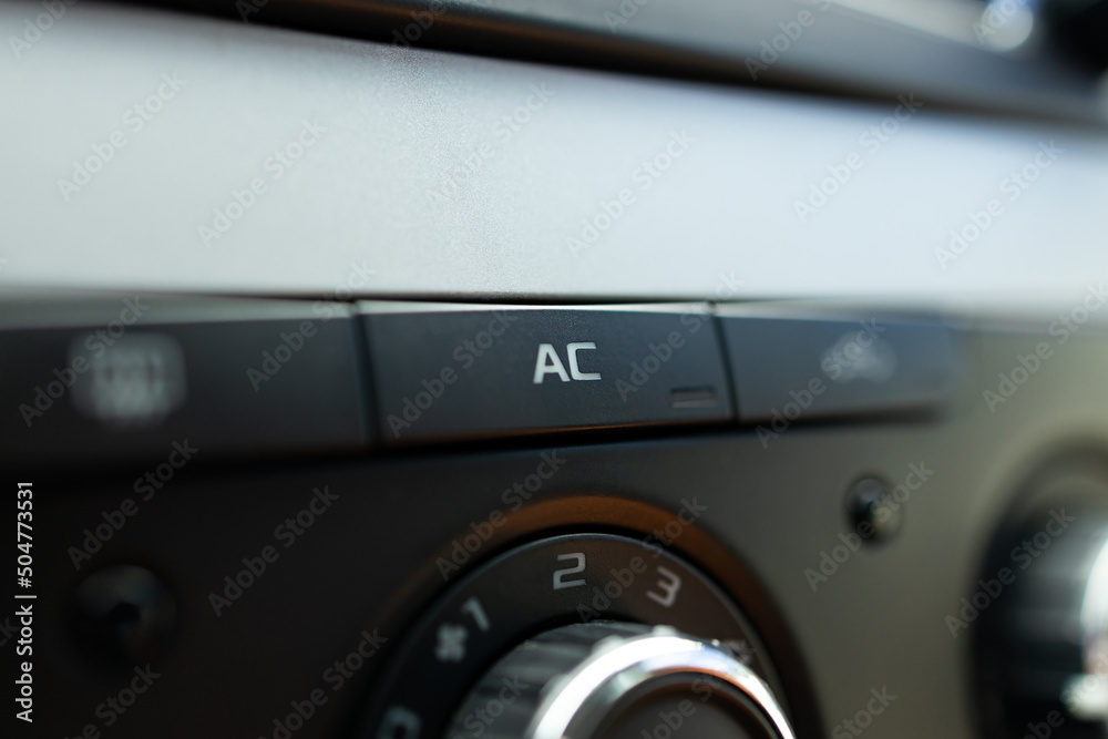 Car ac air turn on off button close up. auto air conditioning repair service concept Car ac air turn on off button close up. auto air conditioning repair service concept