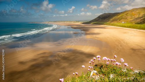 Canvas Print Summer sky warm day in Rhossili beach south wales view over the ocean