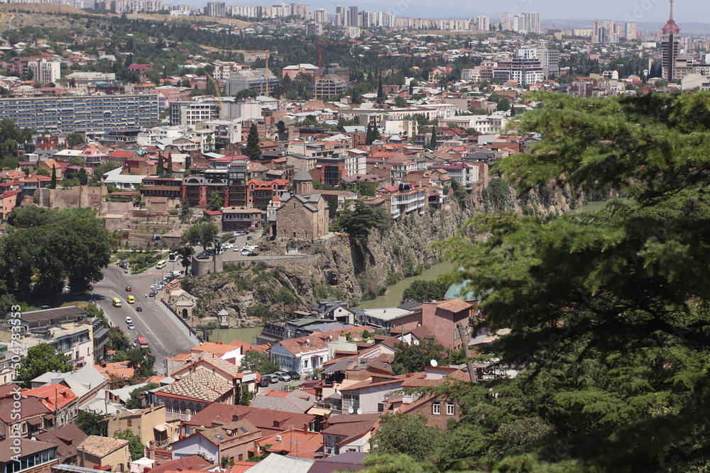 Panoramic top view of Tbilisi city and Kura river