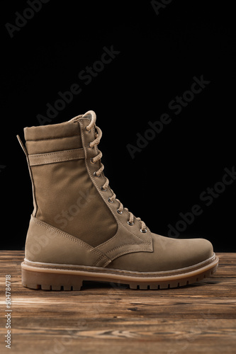 Beige leather summer boots for soldiers. Tactical shoes for military men