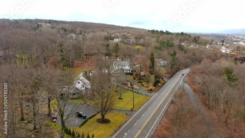 Aerial Dolly Shot Close Up of a Luxury Home on a Hill photo