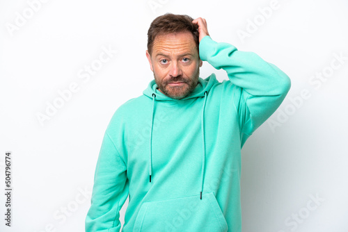 Middle age caucasian man isolated on white background with an expression of frustration and not understanding © luismolinero