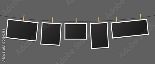 Photos hanging on rope attached with clothes pins. Blank instant photo frames. Wooden clothes pegs with photography. Vector illustration EPS 10