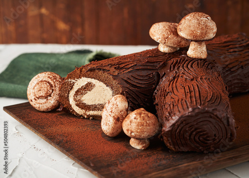Chocolate Christmas Yule Log Cake with Mushrooms 