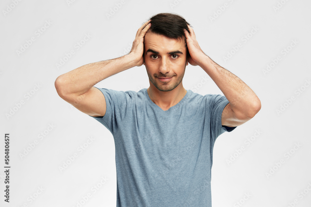 man gesturing with hands blue t-shirt posing isolated background man gesturing with hands blue t-shirt posing isolated background