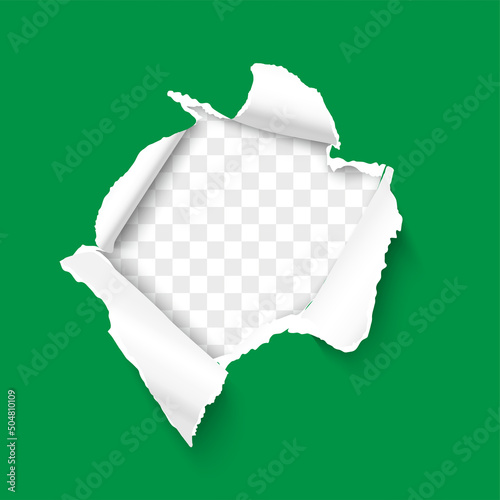 Hole in green paper with torn edges and a transparent background inside. Ripped paper template with copy space