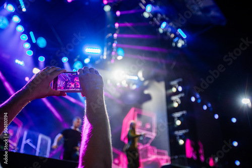 Hands with phones on concert, atmosphere on concert © Ruslan