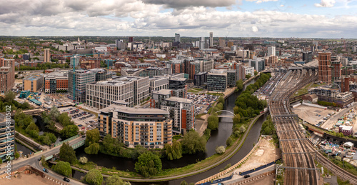 Aerial cityscape view of Leeds city centre and train station photo