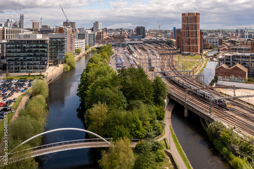 Aerial cityscape view of Leeds city centre and train station photo