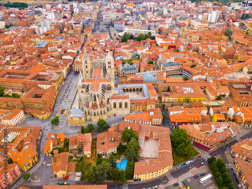 Spanish city of Leon and The House of Light cathedral as seen from drone in summer day
