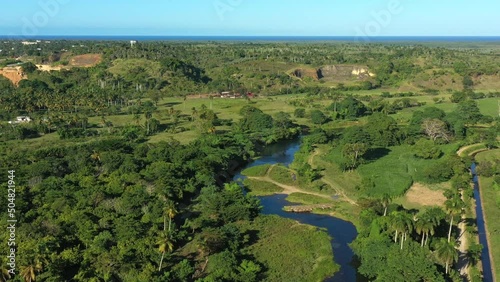 Bridge above Maimon river at Nisibon eco park on way from Higuey to Miches. Dominican Republic. Aerial top view photo