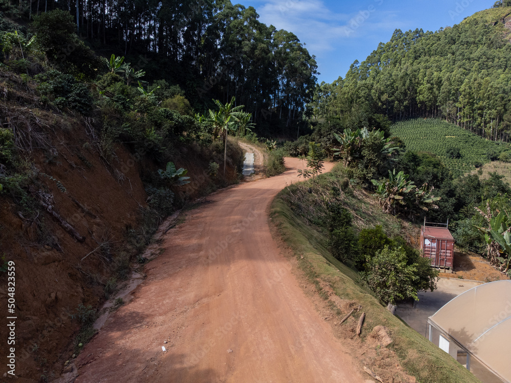 beautiful green valley with coffee, eucalyptus and banana plantation, drone aerial view - Venda Nova, Espirito Santo, Brazil