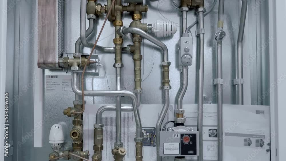 A sample of new modern floor heating equipment that provides warmth and comfort to the house in the cold season. Closeup. Shot in motion A sample of new modern floor heating equipment that provides warmth and comfort to the house in the cold season. Closeup. Shot in motion