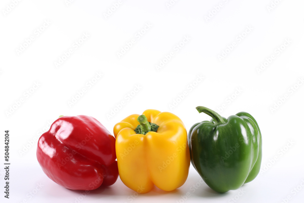 Fresh green sweet pepper yellow sweet pepper and red sweet pepper isolated on a white background. Green red yellow bell pepper. have copy space. Fresh green sweet pepper yellow sweet pepper and red sweet pepper isolated on a white background. Green red yellow bell pepper. have copy space.