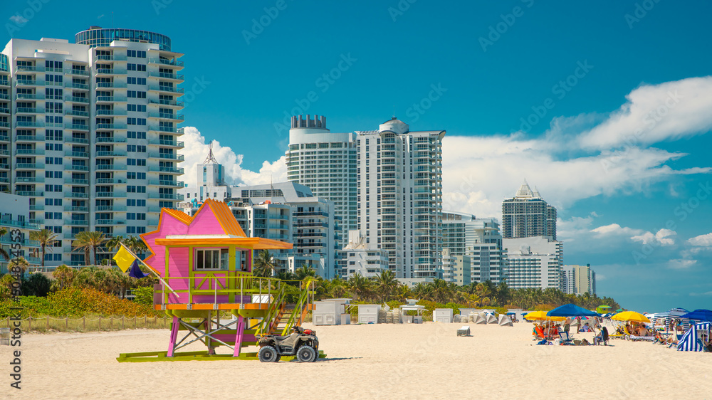 Miami Beach Florida. Panorama of Miami South Beach City FL. Beach lifeguard station or tower. Atlantic Ocean. Summer vacations. Beautiful View on Residential house, Hotels and Resorts on Island.  - obrazy, fototapety, plakaty 