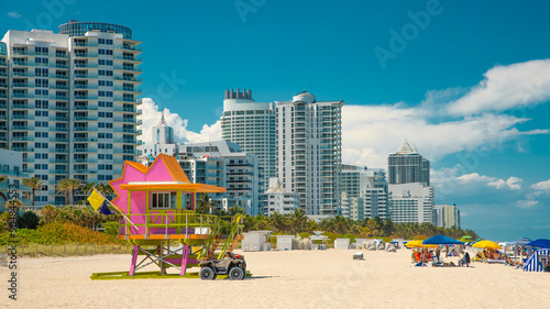 Miami Beach Florida. Panorama of Miami South Beach City FL. Beach lifeguard station or tower. Atlantic Ocean. Summer vacations. Beautiful View on Residential house, Hotels and Resorts on Island.  © artiom.photo