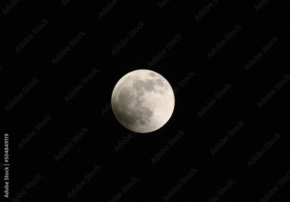 Full moon at start of an eclipse. Full moon at start of an eclipse.