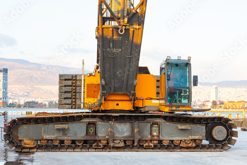 Crawler crane standing on the territory of the port of Izmir in Turkey. photo